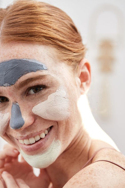 Woman with UNISKIN Vitamin C Vegan Face Mask on her face