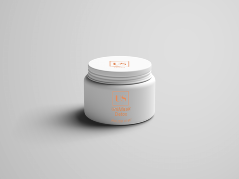 A white container of facial mask, with the logo of uniSkin printed on it.